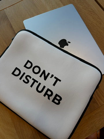 Water-resistant minimalist laptop sleeve with soft faux fur lining and padded zipper