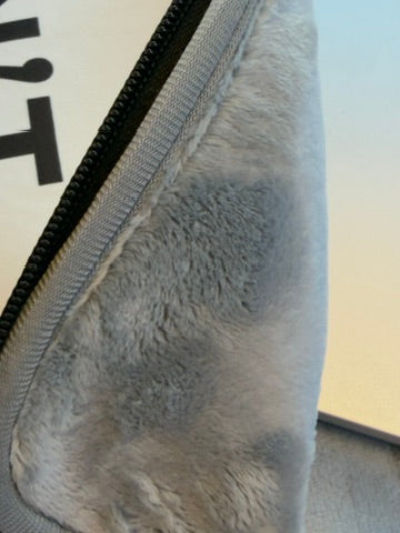 Close-up texture of minimalist water-resistant laptop sleeve fabric