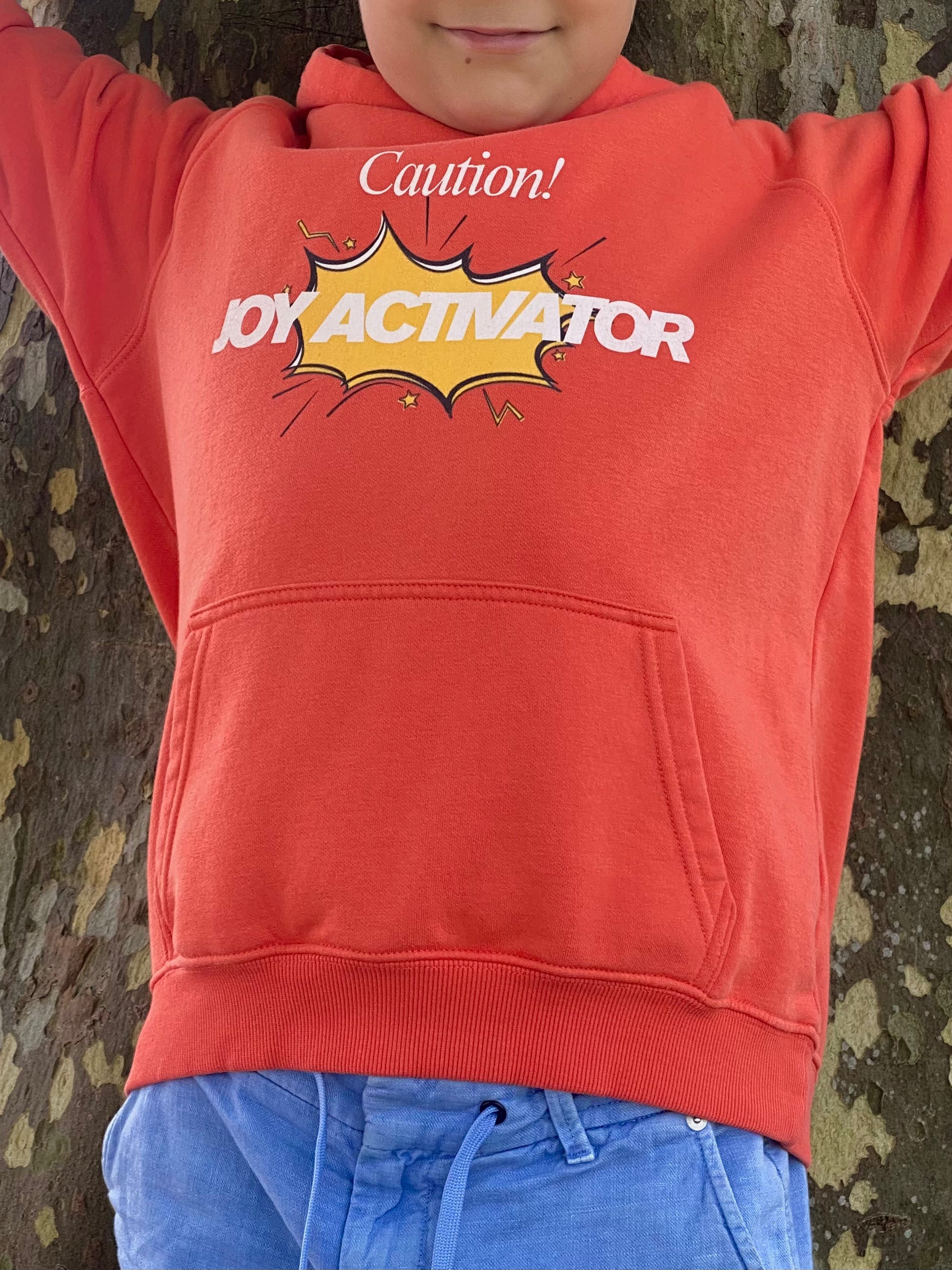 Soft eco fabric of children’s hoodie, organic cotton and recycled polyester blend, sustainable kids fashion