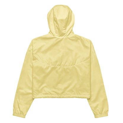 Back view of a lightweight yellow windbreaker jacket, showing its chic silhouette and relaxed fit