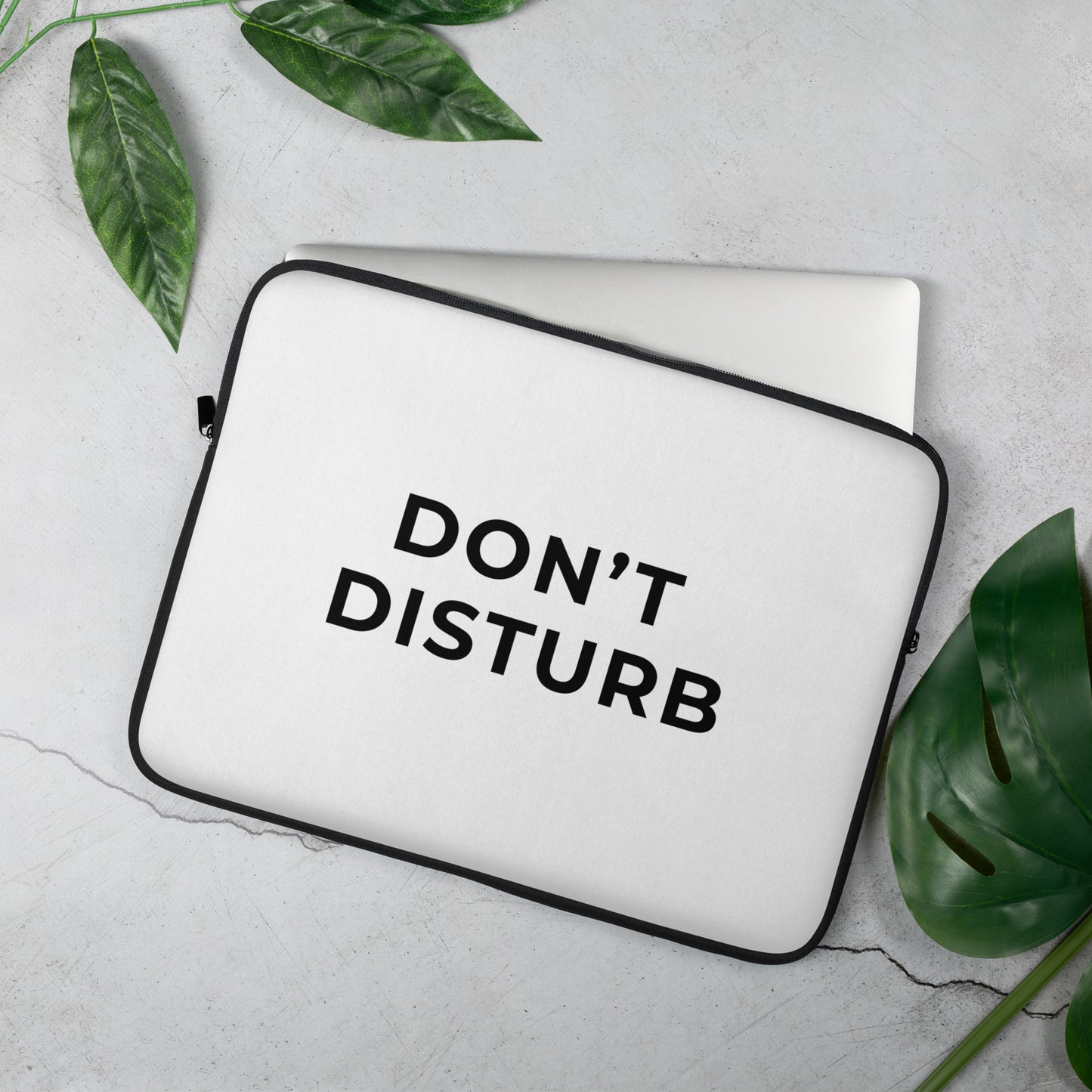 Water-resistant minimalist laptop sleeve with soft faux fur lining and padded zipper