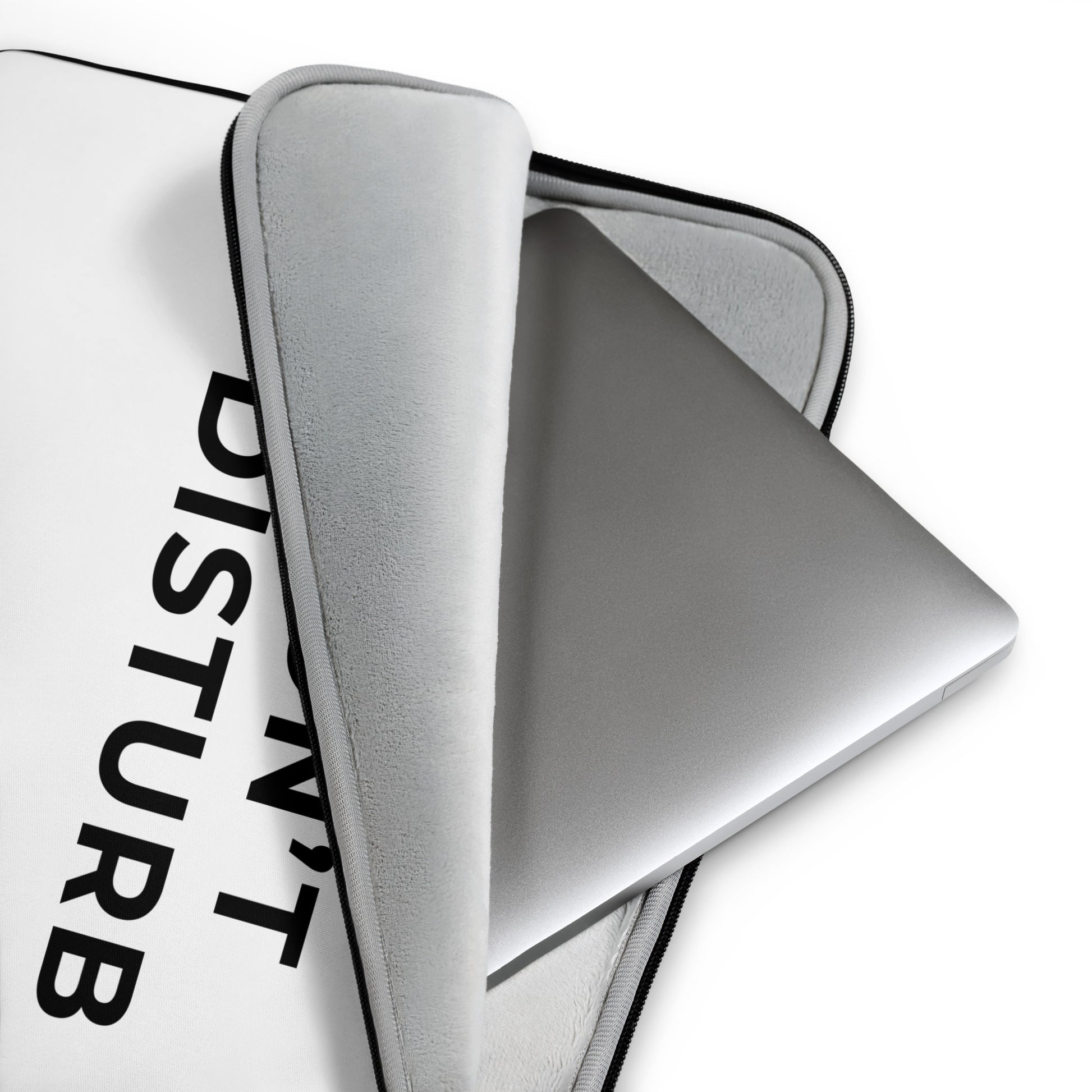 Close-up of water-resistant laptop sleeve with padded zipper and soft faux fur lining detail