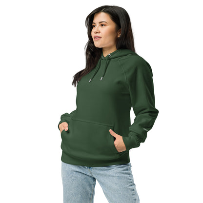 Woman wearing a bottle green organic cotton hoodie with serenity sleeve print, relaxed unisex fit.