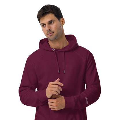 A man wearing eco-friendly burgundy hoodie with raglan sleeves