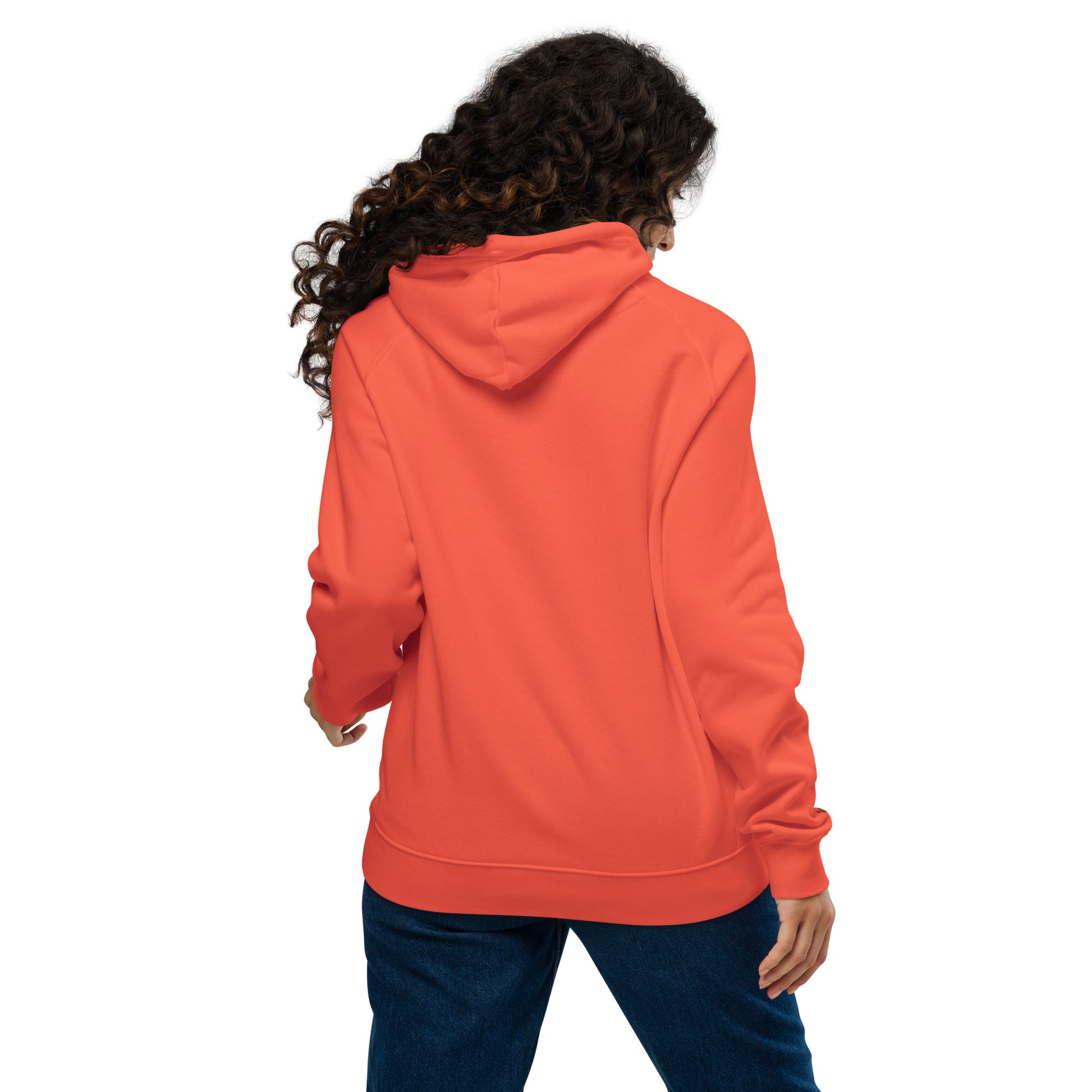 Soft orange unisex hoodie with “joy keeper” embroidery on the sleeve, made from organic cotton — eco-friendly minimalist sweatshirt.