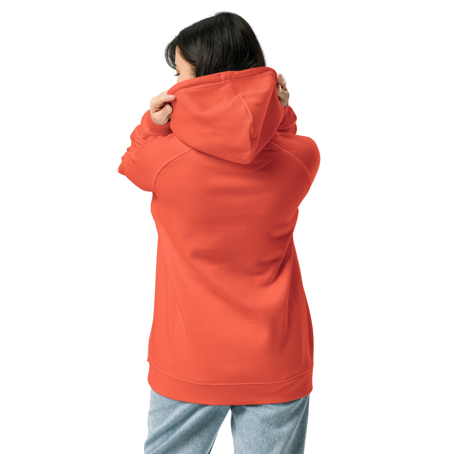 Soft orange unisex hoodie with “joy keeper” embroidery on the sleeve, made from organic cotton — eco-friendly minimalist sweatshirt.