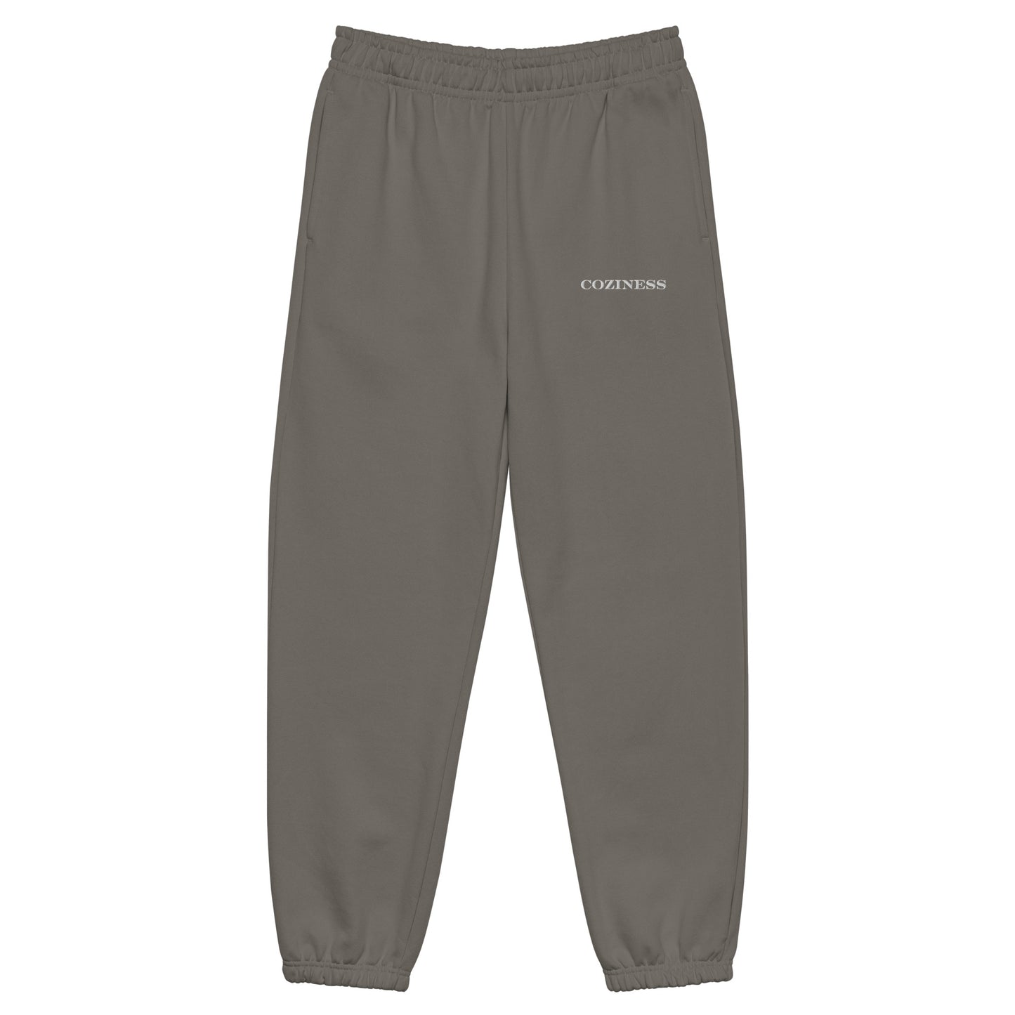Heavyweight sweatpants in Asphalt with soft brushed fleece, white “coziness” embroidery, elastic cuffs, and relaxed fit.