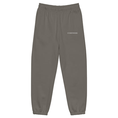 Heavyweight sweatpants in Asphalt with soft brushed fleece, white “coziness” embroidery, elastic cuffs, and relaxed fit.