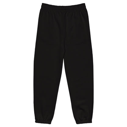 Back view of heavyweight sweatpants in Black with brushed fleece, white “coziness” embroidery, and elastic cuffs for all-day comfort.