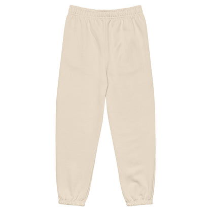 Back view of heavyweight sweatpants in Dust with brushed fleece, black “coziness” embroidery, and elastic cuffs for all-day comfort.