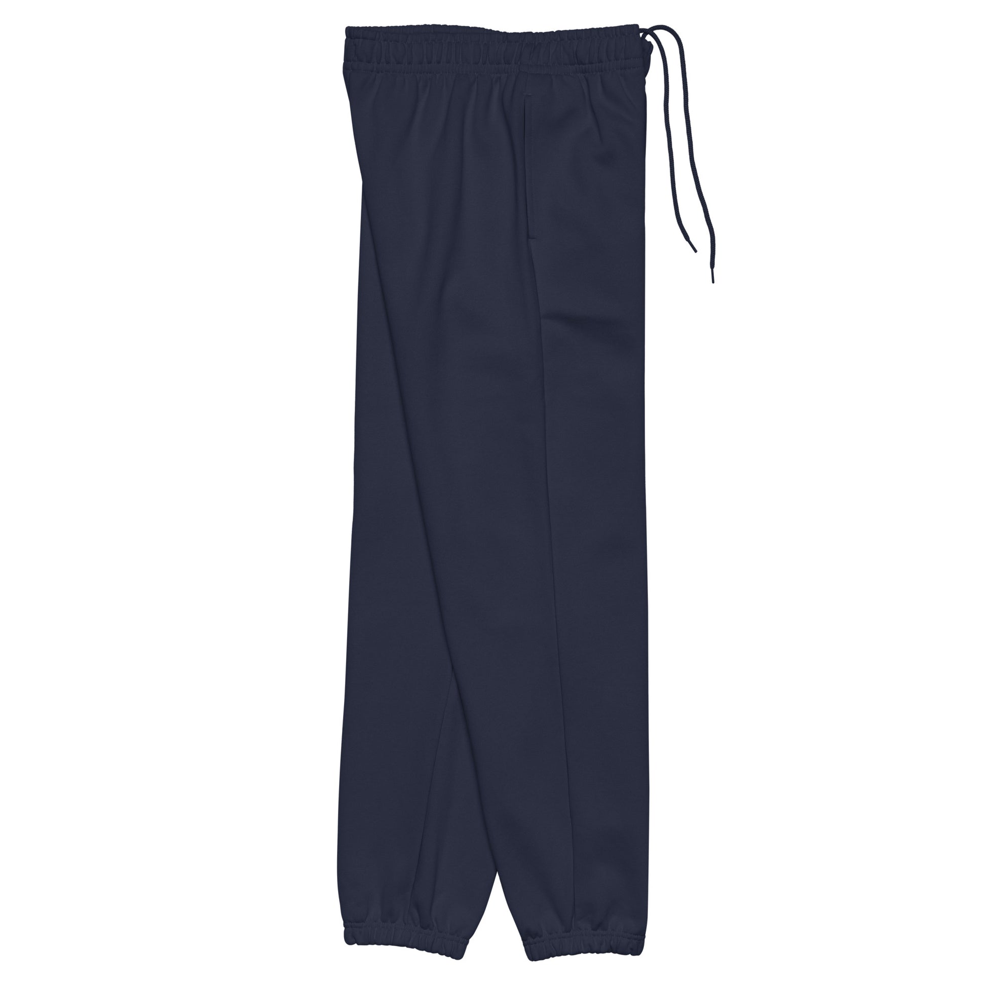 Side view of heavyweight sweatpants in Navy with white “coziness” embroidery, elastic cuffs, and relaxed street-style fit.