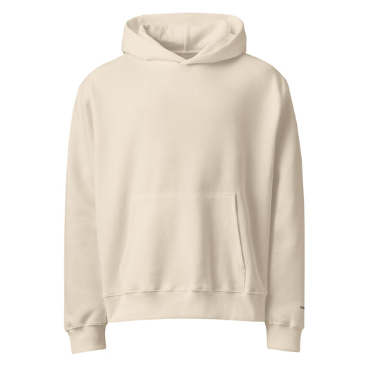 Oversized heavyweight hoodie in Dust with soft cotton fleece and “comfort” sleeve embroidery, cozy unisex fit.