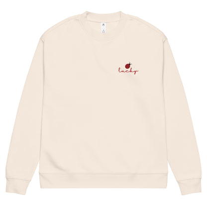 Front view of Lucky ladybug embroidered unisex sweatshirt with relaxed fit and cotton blend fabric
